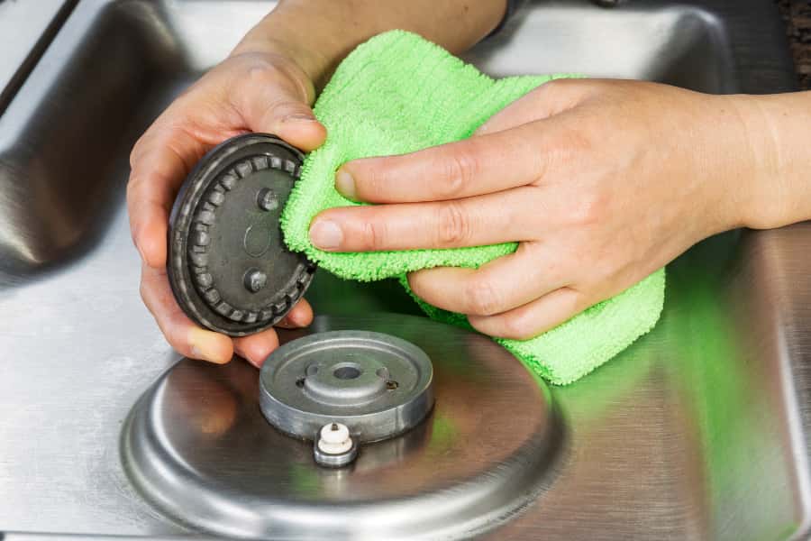 periodic cleaning of gas stove burner