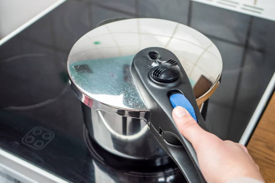 pressure cooker on stove