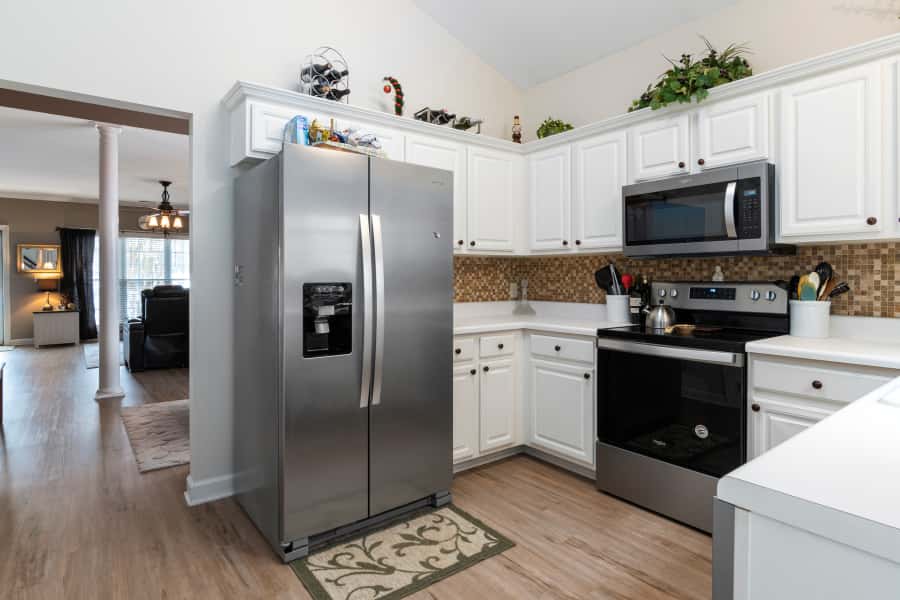 side by side refrigerator in kitchen